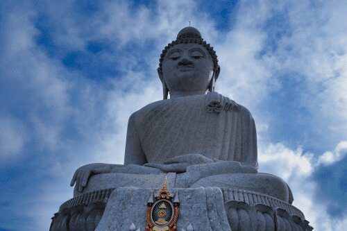 Big Buddha Statue on a beautiful blue sky Roaming Atlas