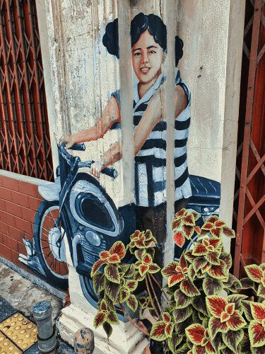 Old Phuket Street Art Girl on Motorbike Roaming Atlas